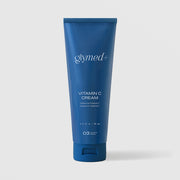 GlyMed Plus Vitamin C Cream in navy blue squeeze tube, 2.0 oz, on light gray background