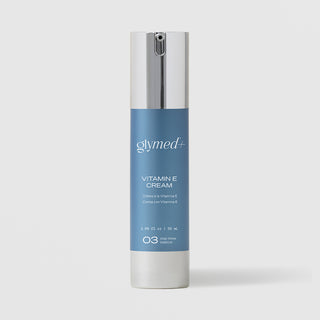 GlyMed Plus Vitamin E Cream white pump bottle with blue label and silver pump, step three balance, 1.69 fl oz 50ml