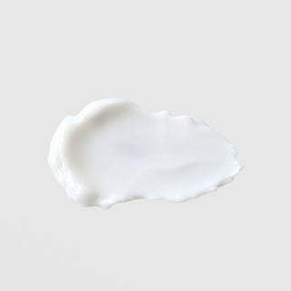 GlyMed Plus Oxygen Cream opaque white rich cream texture swatch with ruffled edges showing thick whipped consistency on grey background