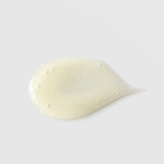 GlyMed Plus Oxygen Deep Pore Masque translucent pale yellow gel texture swatch with oxygen bubbles on grey background