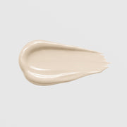 GlyMed Plus Rosacea Relief texture swatch showing smooth, glossy cream in a warm ivory tone on light gray background