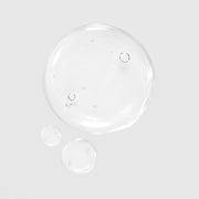 GlyMed Plus Acne Astringent No. 2 with Salicylic Acid texture swatch showing clear, water-like liquid consistency with air bubbles on light gray background