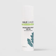 Hale & Hush Sensitive Skin Specialist Broad Spectrum SPF 30 dual shield and hydrate sunscreen in a white airless pump bottle with teal botanical leaf design, 50ml / 1.69 fl oz, on a light gray background
