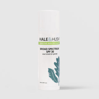 Hale & Hush Sensitive Skin Specialist Broad Spectrum SPF 30 dual shield and hydrate sunscreen in a white airless pump bottle with teal botanical leaf design, 50ml / 1.69 fl oz, on a light gray background
