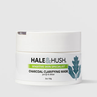 Hale & Hush Sensitive Skin Specialist Charcoal Clarifying Mask purify and detox face mask in a white jar with lid, 3 oz / 86g, with blue botanical leaf design, on a light gray background