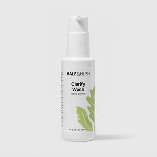 Hale & Hush Clarify Wash renew and revive facial cleanser in a white pump bottle with green leaf botanical design, 96g / 3.4 oz, on a light gray background