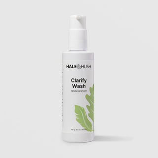 Hale & Hush Clarify Wash renew and revive facial cleanser in a white pump bottle with green leaf botanical design, 185g / 6.5 oz, on a light gray background