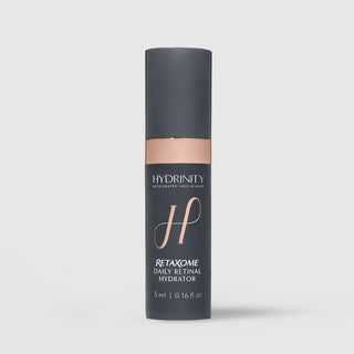 Hydrinity RetaXome Daily Retinal Hydrator 5ml travel size in charcoal gray pump bottle with rose gold band and script H logo