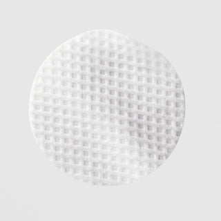 Close-up of textured fabric surface of a RetaXome Retinal Boost Treatment Pad