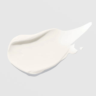 Hydrinity Hydri-C Daily Vitamin C Moisturizer texture swatch showing lightweight white cream formula on grey background.
