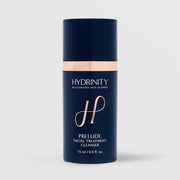 Hydrinity Prelude Facial Treatment Cleanser 15ml travel size in navy blue pump bottle with rose gold accent band and logo