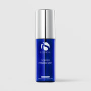 iS Clinical Copper Firming Mist cosmeceutical facial spray in a cobalt blue bottle with silver pump cap