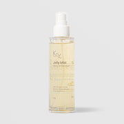 KrX Aesthetics Jelly Mist Spray On Gel Mask 105g clear spray bottle showing golden gel formula with 2% niacinamide, betaine, flower extracts, hyaluronic acid, and glutathione