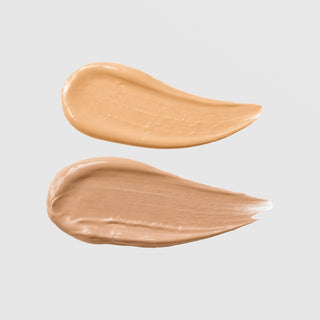 KrX Skin Filter Tinted Sunscreen SPF 50 PA++++ texture swatches showing two shades: medium tan and light beige cream formula on grey background.
