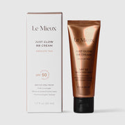 Le Mieux Just Glow BB Cream Medium Tan Broad Spectrum SPF 50 UVA UVB protection 1.7 fl oz 50 ml deep bronze metallic tube shown with white retail box. Full coverage mineral-based sunscreen dermatologist tested. Available at Art of Skin Care