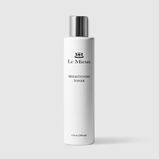 Le Mieux Brightening Toner facial toner 6 fl oz 180 ml tall white bottle with silver cap. Available at Art of Skin Care