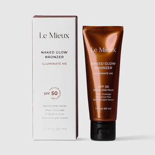 Le Mieux Naked Glow Bronzer Illuminate Me Broad Spectrum SPF 50 1.7 fl oz 50 ml shown with retail box. Full coverage mineral-based sunscreen UVA UVB protection dermatologist tested. Available at Art of Skin Care