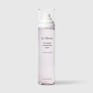 Le Mieux Iso-Rose Hydrating Mist soothe and uplift facial mist 5.1 fl oz 150 ml tall clear bottle with soft pink rose-tinted formula white pump dispenser and clear protective cap. Available at Art of Skin Care