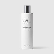 Le Mieux Oh My Glow Activator facial glow activator 8 fl oz 240 ml tall white bottle with silver cap. Available at Art of Skin Care