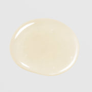 Le Mieux Vita-C Serum texture swatch showing lightweight pale yellow vitamin C serum formula on grey background.