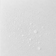 Michele Corley Plump Me Up Peptide Mist texture close-up showing ultra-fine clear mist droplets on white surface.