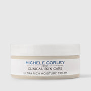 Michele Corley Clinical Skin Care Ultra Rich Moisture Cream in white jar with lid on grey background.