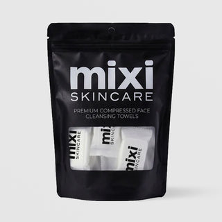 Mixi Skincare Premium Compressed Face Cleansing Towels in resealable black pouch with individually wrapped towels