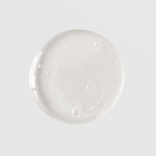 Mixi Clean Gel Cleanser lightweight clear gel texture swatch with micro-bubbles, translucent formula shown on grey background