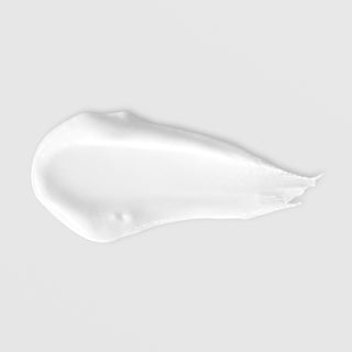 Mixi Clear Plex BPO Acne Gel texture swatch showing smooth white benzoyl peroxide gel formula on grey background.