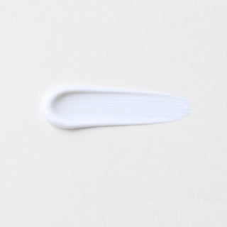 Mixi Peptide Rescue Moisturizer texture swatch showing smooth lightweight cream formula on grey background.