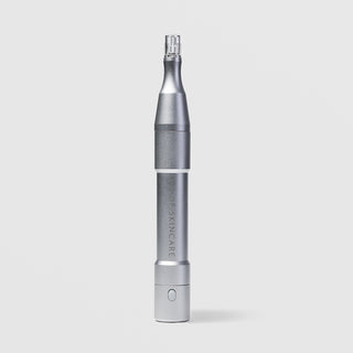 Art of Skin Care Nano Infusion Pen in brushed silver with a clear nano-tip cartridge and a power button at the base, displayed upright against a light gray background.