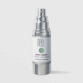 NeoGenesis Body Cream Hydrate and Rejuvenate 30 mL in a white airless pump bottle with full chrome silver pump hardware and sage green water drop icon label on a light gray background