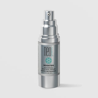 NeoGenesis Booster Advanced Renewal Serum 30 mL in a full chrome silver airless pump bottle with teal molecular icon label on a light gray background