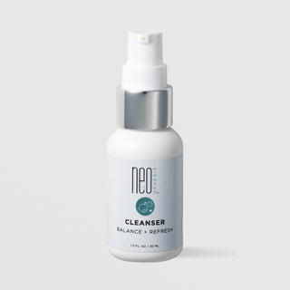 NeoGenesis Cleanser Balance and Refresh 30 mL in a white pump bottle with chrome silver collar and teal bubble icon label on a light gray background