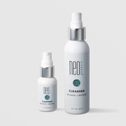 NeoGenesis Cleanser Balance and Refresh in two sizes: 30 mL and 120 mL, shown side by side in white pump bottles with chrome silver collars and teal bubble icon labels on a light gray background