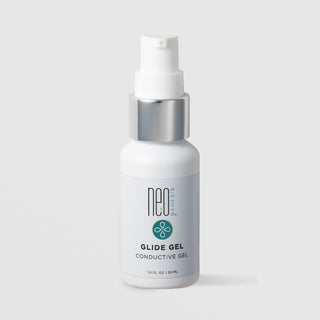 NeoGenesis Glide Gel Conductive Gel 30 mL in a white pump bottle with chrome silver collar and teal four-petal icon label on a light gray background