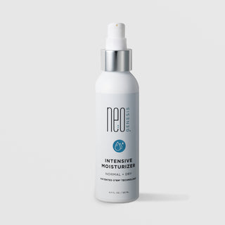 NeoGenesis Intensive Moisturizer Normal and Dry 120 mL in a tall white pump bottle with chrome silver collar and teal water drop icon label on a light gray background
