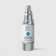 NeoGenesis Intensive Moisturizer Normal and Dry 30 mL in a white airless pump bottle with full chrome silver pump hardware and teal water drop icon label on a light gray background