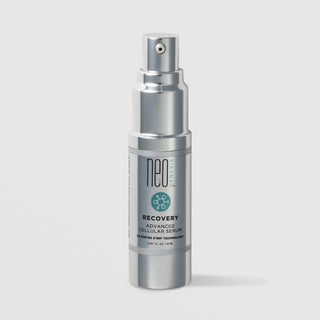 NeoGenesis Recovery Advanced Cellular Serum 15 mL in a full chrome silver airless pump bottle with teal molecular icon label on a light gray background