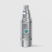 NeoGenesis Recovery Advanced Cellular Serum 30 mL in a full chrome silver airless pump bottle with teal molecular icon label on a light gray background