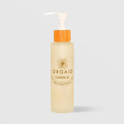 ORGAID Cleansing Oil Ultra Deep Cleanse frosted pump bottle with bamboo cap on grey background
