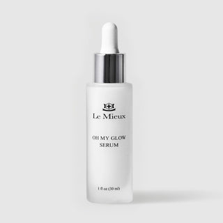 Le Mieux Oh My Glow Serum facial serum 1 fl oz 30 ml frosted white glass dropper bottle with silver collar and white rubber bulb. Available at Art of Skin Care
