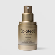 Plated Skin Science INTENSE Serum gold pump bottle with cap removed, showing airless pump dispenser design