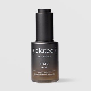 Plated Hair Science Hair Serum in matte black glass dropper bottle with cap on, featuring Renewosome technology for hair thinning and scalp health