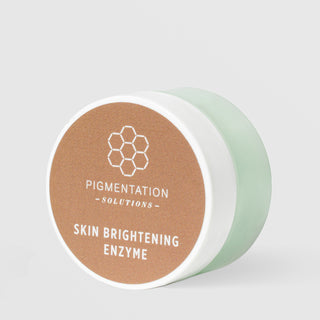 Rhonda Allison Pigmentation Solutions Skin Brightening Enzyme mask in a small white jar with sage green sides and terracotta brown honeycomb lid label on a light gray background
