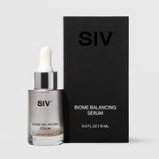 SIV Biome Balancing Serum 15mL glass dropper bottle with metallic silver finish beside its matte black box, 0.5 fl oz