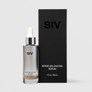 SIV Biome Balancing Serum 30mL glass dropper bottle with metallic silver finish beside its matte black box, 1 fl oz
