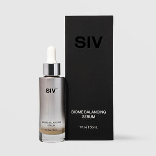 SIV Biome Balancing Serum 30mL glass dropper bottle with metallic silver finish beside its matte black box, 1 fl oz