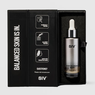 SIV Biome Balancing Serum 30mL dropper bottle nestled in black foam-lined gift box with open lid showing clinically tested, allergy tested, and safe for sensitive skin icons