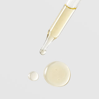 Save Our Skin C2S Skin Balancing Serum pale gold lightweight serum drops falling from glass dropper on grey background